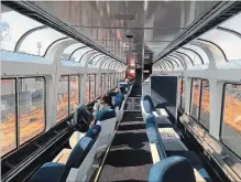  ?? NICOLE EVATT THE ASSOCIATED PRESS ?? Passengers relax in the observatio­n car of Amtrak’s Coast Starlight on the way from Los Angeles to Seattle.