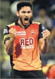  ?? PTI ?? Basil Thampi celebrates the wicket of Surya Kumar Yadav.