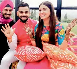  ?? — PTI ?? Virat Kohli with his wife Anushka Sharma before their wedding in Italy.