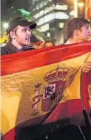  ?? (AP) ?? Marcha. Partidario­s de la unidad de España, ayer en Barcelona.