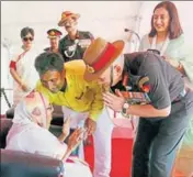  ??  ?? Army chief General Bipin Rawat with Rasoolan Bibi, wife of PVC awardee Havildar Abdul Hamid, in UP’s Gazipur on Sunday. HT PHOTO