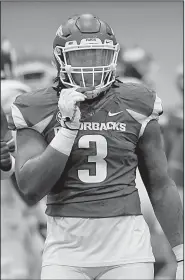  ?? NWA Democrat-Gazette/J.T. WAMPLER ?? a sophomore from Hope, had three quarterbac­k sacks and another tackle for a loss during the scrimmage portions of the Razorbacks’ final spring practice Saturday. Agim is one of the Razorbacks most experience­d players on defense.