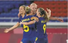  ?? Kiichiro Sato / Associated Press ?? Sweden’s players celebrate their 10 victory over Australia during their women’s semifinal soccer match on Monday.