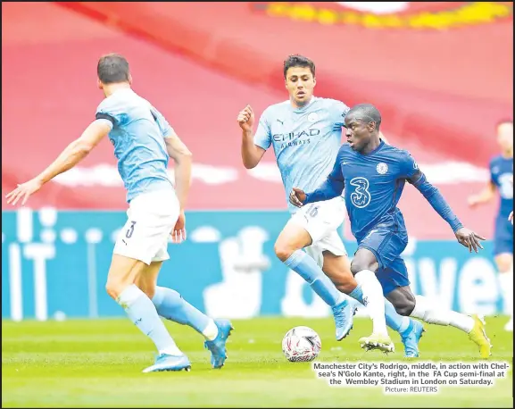  ?? Picture: REUTERS ?? Manchester City’s Rodrigo, middle, in action with Chelsea’s N’Golo Kante, right, in the FA Cup semi-final at the Wembley Stadium in London on Saturday.