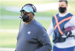  ?? BILL KOSTROUN/AP ?? Dolphins defensive line coach Marion Hobby accepted the same job with the Cincinnati Bengals after parting ways with Miami.