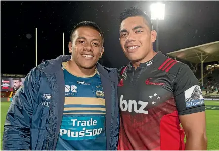  ?? PHOTO: GETTY IMAGES ?? Michael Alaalatoa, right, pictured with brother and Wallabies prop Alan Alaalatoa earlier this year during Super Rugby.