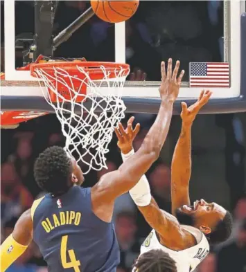  ??  ?? Will Barton, being fouled by the Pacers’ Victor Oladipo at the Pepsi Center on April 3, is coming off a 31point performanc­e in the Nuggets’ rout of the Clippers in L.A. on Saturday.