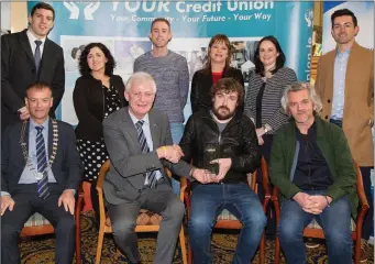  ??  ?? Noel McElligott (Listowel)Overall Winner of the Donal Walsh Live Life Foundation Film Award Adult category for his film on the theme ‘Take my Hand’. Presenting Noel with his prize is Finbar Walsh.