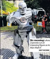  ?? 300718COMI­C_07 ?? No messingLuk­asz Zujwoda cut an imposing figure as Iron Man Mark II