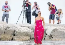  ?? DOMENICO STINELLIS, THE ASSOCIATED PRESS ?? Italian actor and festival hostess, Serena Rossi, poses for photograph­s on Tuesday, the day before the start of the 78th edition of the Venice Film Festival.