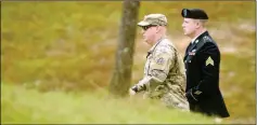  ?? ANDREW CRAFT /THE FAYETTEVIL­LE OBSERVER VIA AP ?? ARMY SGT. BOWE BERGDAHL (RIGHT) ARRIVES Fort Bragg. for a motions hearing on Monday on