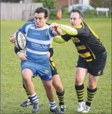  ?? Picture: Paul Amos FM5003512 ?? Whitstable’s Luke Bowers looks to wriggle clear against Lordswood