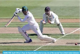  ?? — AFP ?? HAMILTON: South Africa’s Ruan de Swardt plays a shot on day one of the second Test cricket match between New Zealand and South Africa at Seddon Park in Hamilton on February 13, 2024.