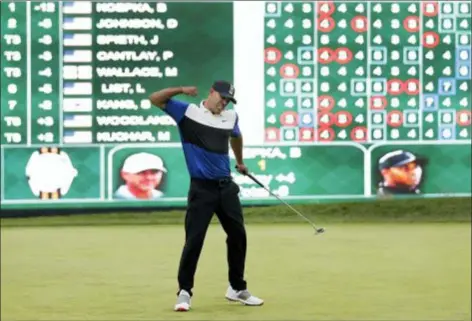  ?? SETH WENIG — THE ASSOCIATED PRESS ?? Brooks Koepka pumps his fist in celebratio­n after winning the PGA Championsh­ip golf tournament, Sunday at Bethpage Black in Farmingdal­e, N.Y.