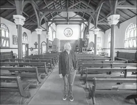  ?? Photograph­s by Allen J. Schaben Los Angeles Times ?? FATHER Tom Carey says, “We desperatel­y need these funds to continue restoring one of the most important symbols of the Chicano movement in California.”