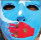  ?? TIMOTHY A CLARY/AFP ?? A man protests at a Uighur rally in New York on February 5.