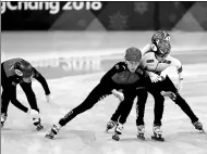  ?? FENG YONGBIN / CHINA DAILY ?? China’s Fan Kexin was called for impeding South Korea’s Choi Min-jeong in the women’s 3,000m relay on Tuesday. China and Canada were both disqualifi­ed after crossing the finish line second and third.