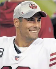  ?? GETTY IMAGES ?? 49ers quarterbac­k Jimmy Garoppolo smiles during the third quarter against the Los Angeles Rams on Sunday.