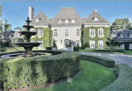  ?? BARRY COHEN HOMES ?? The house at 68 The Bridle Path in Toronto once belonged to late real estate developer Robert Campeau. The French Chateau includes features such as 10 bedrooms, 14 bathrooms, a state-of-the-art gourmet kitchen, and an indoor, two-storey, 50-foot...