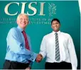  ??  ?? Mr. Simon Culhane, Chartered FCSI - Chief Executive Officer of CISI UK Congratula­tes Majid Ikram Thowfeek, from the British School of Kuwait (BSK) and a student of First Global Academy, for becoming the first in the world to have the Islamic Finance...