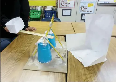  ??  ?? (Above) Rio Vista Elementary School fifth-grade students Brianna Winters and Madison Rodriguez won a prize for their engineerin­g design in the 2018 Fluor Engineerin­g Challenge. Using materials like plastic cups, tape, pencils and rulers, the Rio Vista...