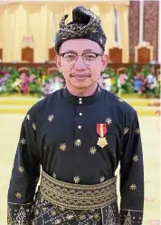  ??  ?? as the selangor ruler’s press secretary, azrul is responsibl­e for managing the state palace’s social media and media relations.