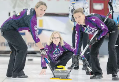  ?? LIAM RICHARDS ?? Amber Holland’s rink dropped a 7-3 loss to Winnipeg’s Shannon Birchard on Friday at the World Curling Tour’s Colonial Square Ladies Curling Classic. It was the first outing in a while for the 2011 national Scotties champ, who hopes to return to the...