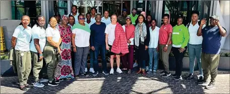  ?? ?? Mr. Alexander Tope Ajayi (in-between Coach Waldrum and leader of delegation Rt. Hon. Margaret Icheen) with some members of the Super Falcons’ delegation in Pretoria...on Wednesday.