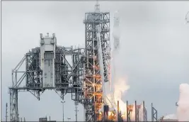  ?? NASA TV VIA THE ASSOCIATED PRESS ?? The SpaceX Falcon rocket, carrying a load of supplies for the Internatio­nal Space Station, launches Sunday from the Kennedy Space Center in Florida. The rocket flew from historic Launch Complex 39A, where the Apollo moon rockets launched.