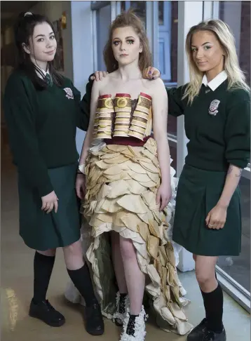  ??  ?? Naoise O’Connell, Amy Howick and Hannah Brennan with their design ‘Caffeine Addiction’.