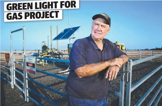  ?? Picture: PETER BRITTA CAMPION ?? WAITING GAME: Farmer Peter Gett with one of three Santos coal seam gas pilot wells on his property outside Narrabri.