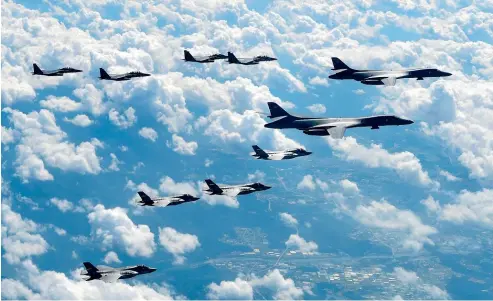  ?? AP ?? US Air Force B-1B bombers, F-35B stealth fighter jets and South Korean F-15K fighter jets fly over the Korean Peninsula during joint drills.