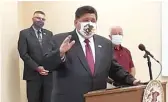 ?? NEAL EARLEY/CHICAGO SUN-TIMES ?? Gov. J.B. Pritzker speaks at a news conference at the Adams County Public Health Department in Quincy on Monday.