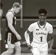  ?? Charlie Riedel / Associated Press ?? Tyon Grant-Foster celebrates after Kansas escaped with a 65-61 victory over winless North Dakota State.