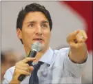  ?? The Canadian Press ?? Prime Minister Justin Trudeau speaks during a town hall meeting at Western University on Friday in London, Ont.