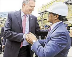  ??  ?? Mayor de Blasio with one of his fund-raisers, Husam Ahmad, whose contractin­g firm has been probed by Department of Investigat­ion.