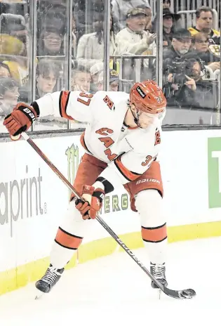  ?? BOB DECHIARA USA TODAY Sports ?? Carolina Hurricanes right wing Andrei Svechnikov (37) flips the puck on the blade of his stick prior to scoring a goal during the second period against the Boston Bruins at TD Garden.