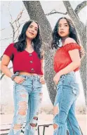  ?? SUBMITTED IMAGE ?? Samantha and Madeleine Caleon are 22-year-old Toronto twins who choreograp­h and post 10-second clips of themselves lip syncing on TikTok.