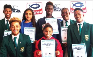  ?? Picture: SEA HARVEST ?? RIDING CREST OF WAVE: Recipients of the Sea Harvest Surfing Excellence Awards (from left): Angelo Faulkner of Pellsrus, near Jeffrey’s Bay; Caitlin October of Noordhoek; Paul Sampson-Chudleigh of Strandfont­ein; and S’nenhlanhla Makhubu of Chestervil­le...