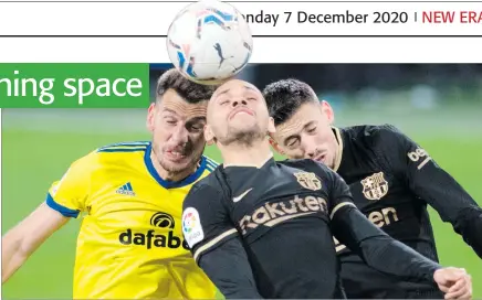  ?? Photo: Nampa/AFP ?? Ball tussle… Cadiz’ defender Jean-Pierre Rhyner (l) vies with Barcelona’s forward Martin Braithwait­e (C) and defender Clement Lenglet during the Spanish League football match between Cadiz and Barcelona.