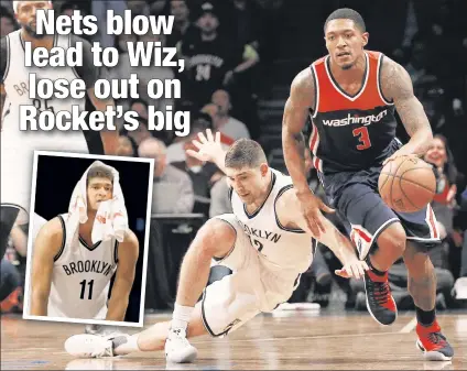  ?? Christophe­r Pasatieri; AP ?? FRUSTRATIN­G FINISH: The Wizards’ Bradley Beal steals the ball from the Nets’ Joe Harris to help close out his team’s 118-113 win at Barclays Center, much to the disappoint­ment of Brook Lopez (inset).