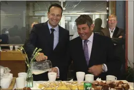  ??  ?? Ministers Varadkar and Doyle at County Buildings on Monday evening.