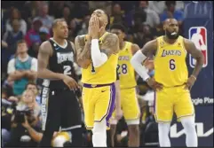  ?? Associated Press ?? Los Angeles Lakers guard D’Angelo Russell (1) reacts during the second half of Game 2 in a first-round NBA playoff series against the Memphis Grizzlies, Wednesday, in Memphis, Tenn. The Grizzlies won 103-93 to even the series at 1-1.