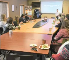  ??  ?? More than 20 representa­tives from community agencies gather in the Holy Trinity Catholic School Division board room for a luncheon that celebrated their efforts to help students succeed. Photo by Jason G. Antonio