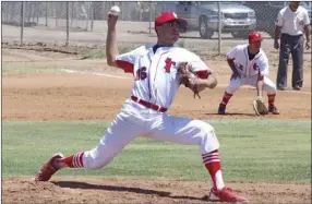  ??  ?? Imperial High’s Jonathan Reyes delivers a pitch during the Tigers’ CIF-San Diego Section Div. IV playoff game against Mission Vista on Saturday.