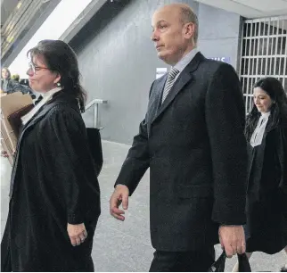  ?? DAVE SIDAWAY ?? Defence lawyer Isabel Schurman and Frank Zampino leave the courtroom at the Palais de Justice in February. The Contrecoeu­r trial began more than a year ago, but only heard from witnesses last month.