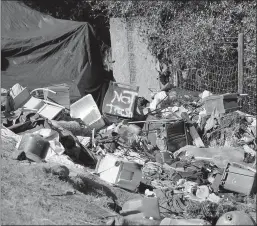  ?? Guy Mccarthy / Union Democrat ?? A homeless encampment is near the Lowe's Home Improvemen­t big-box store off Old Wards Ferry Road and above Highway 108. A volunteer group who call themselves #1pileatati­me plan to start a multi-day project this Saturday to remove truckloads of trash from the area.