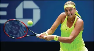  ?? – AFP ?? GETTING BETTER: Petra Kvitova of the Czech Republic hits a return against Cagla Buyukakcay of Turkey during their second round match in the U.S. Open in New York on Wednesday.