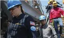  ?? Photograph: AP ?? Engineers from the bureau of safety and environmen­tal enforcemen­t inspect an oil platform in the Gulf of Mexico in 2018.