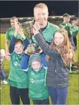  ?? (Pic: John Ahern) ?? Tom Kenneally, celebratin­g a famous county final win with children, Ruairi, Fionn and Lily.